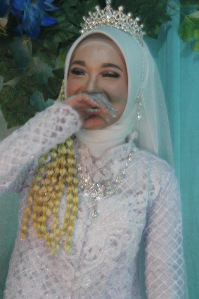 Beautiful Indonesian Muslim bride. photo