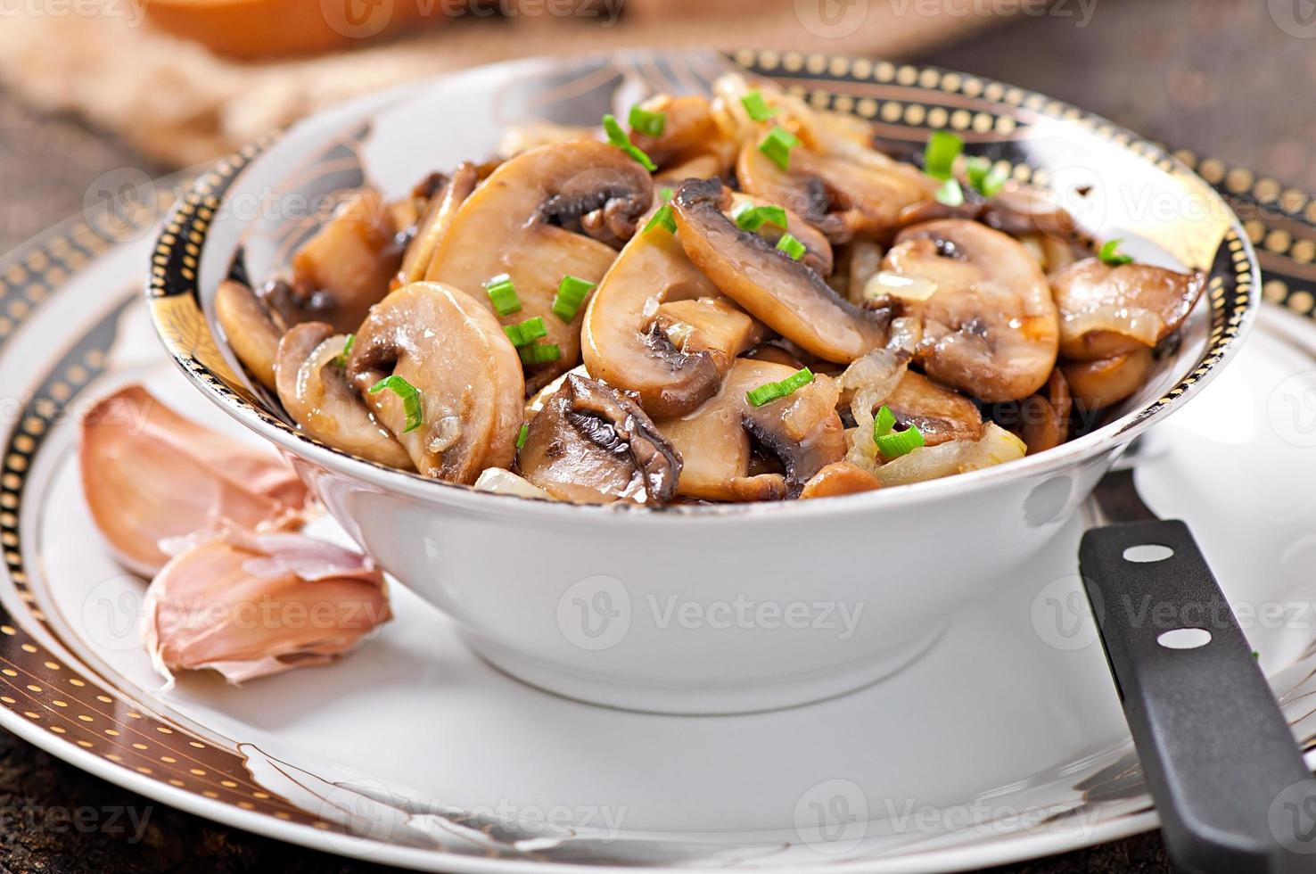 Fried mushrooms and onions photo