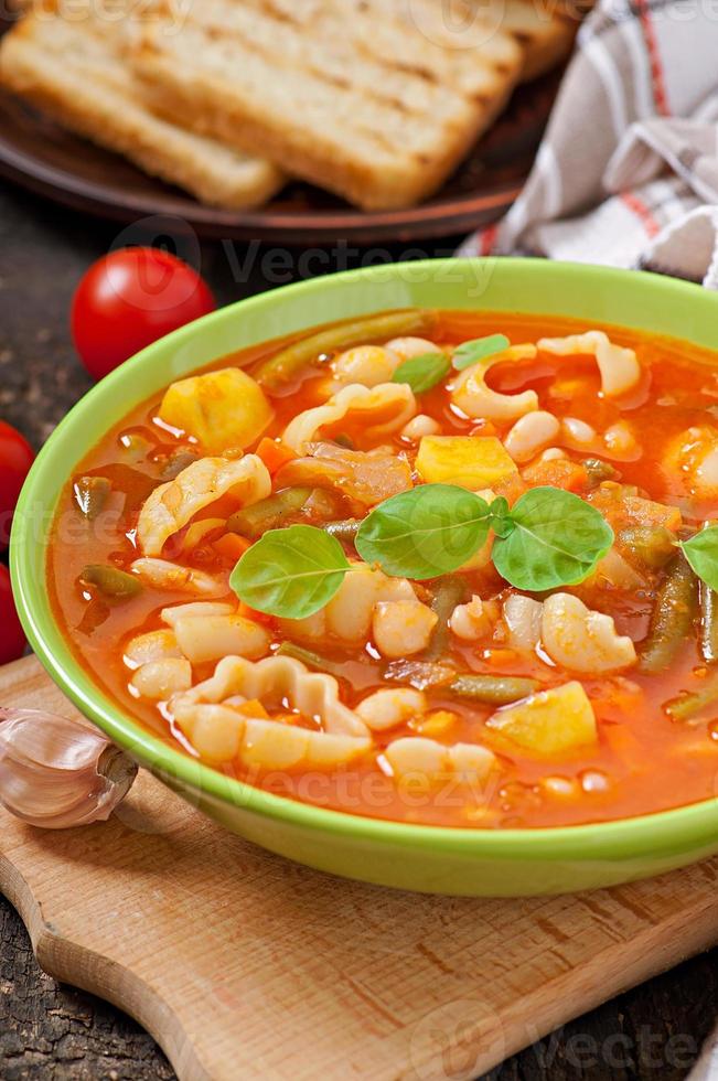 Minestrone, italian vegetable soup with pasta photo