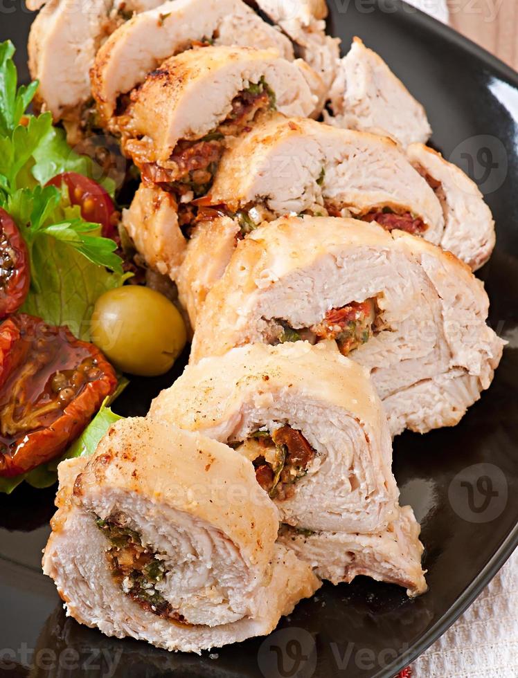 Rolled Chicken with spinach and sun-dried tomatoes photo