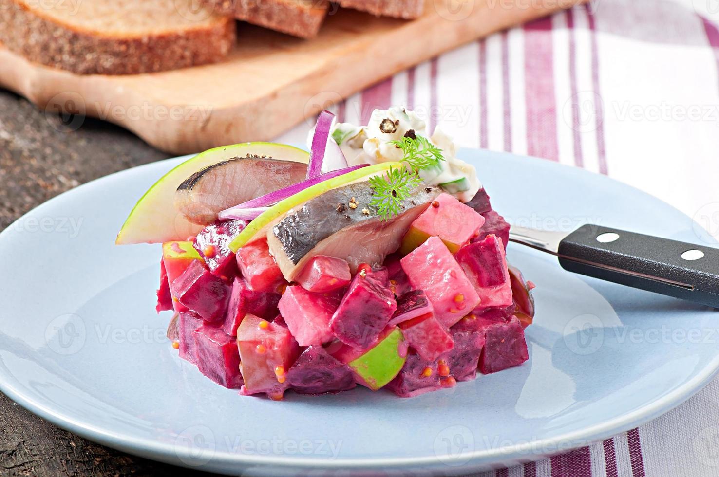 Herring salad with sour cream sauce photo