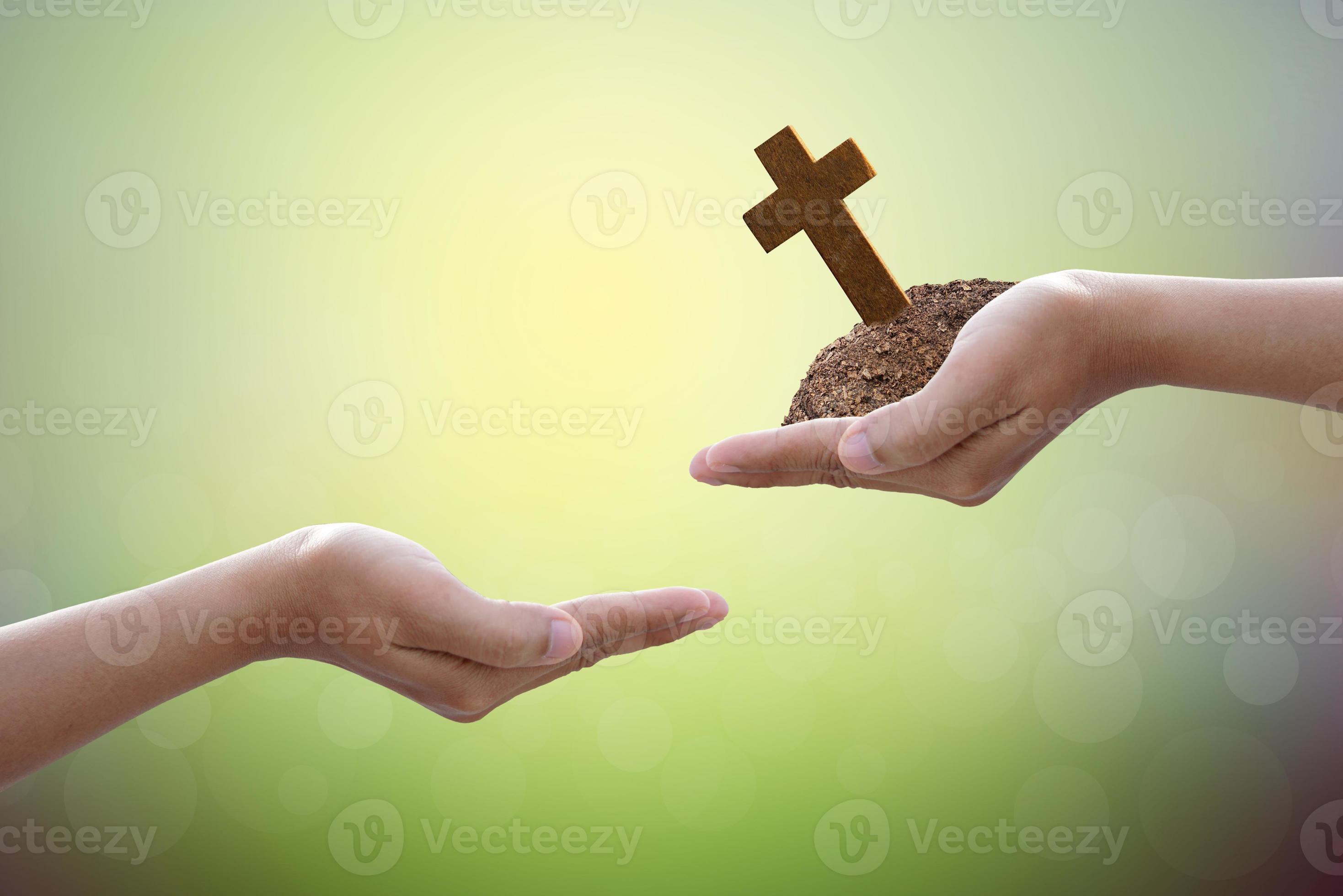 Hand give cross on nature background 7425369 Stock Photo at Vecteezy