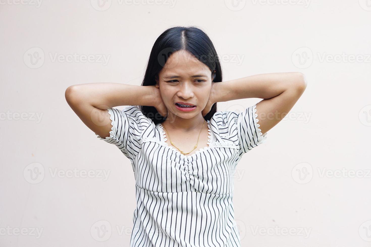 Asian woman has neck pain photo