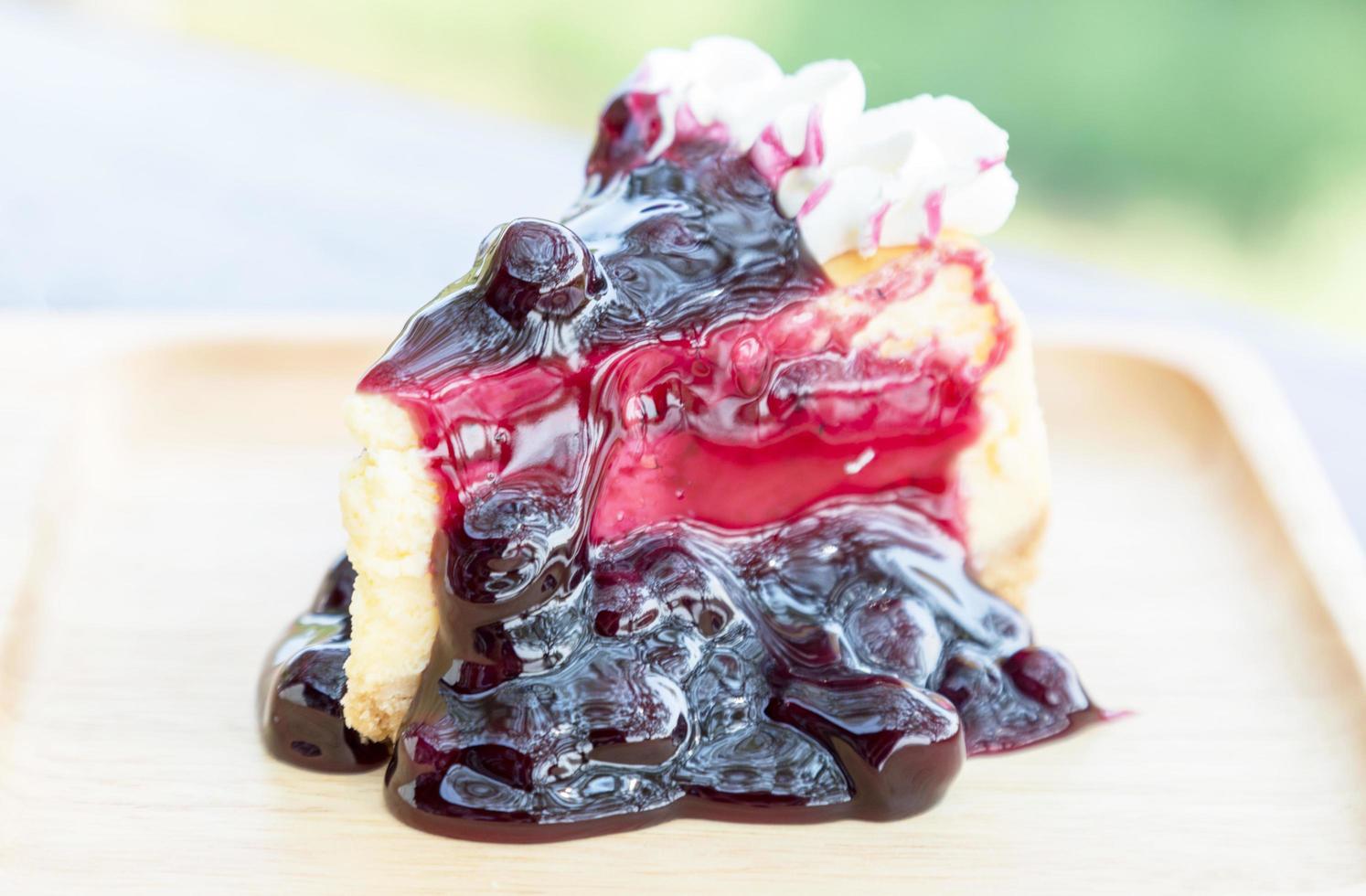 Blueberry cheesecake with cream photo