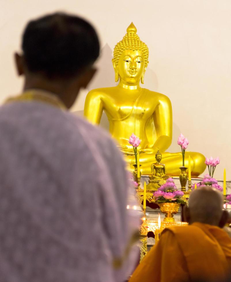 Behind seniors Buddha. photo
