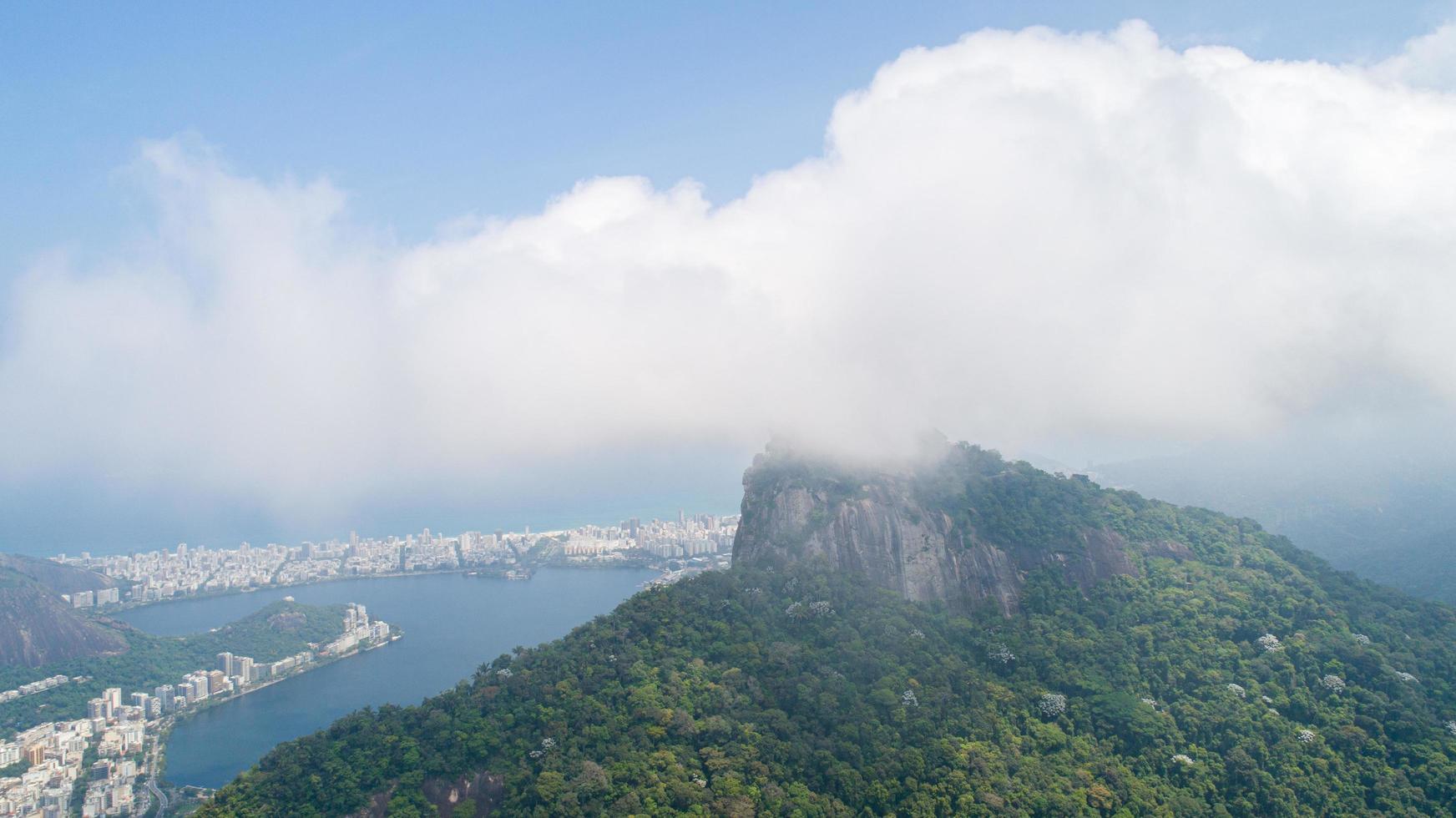 Rio de Janeiro, Rio de Janeiro, Brazil, Circa October 2019 Aerial view of Cristo Redentor, Christ the Redeemer Statue over Rio de Janeiro City, Brazil photo