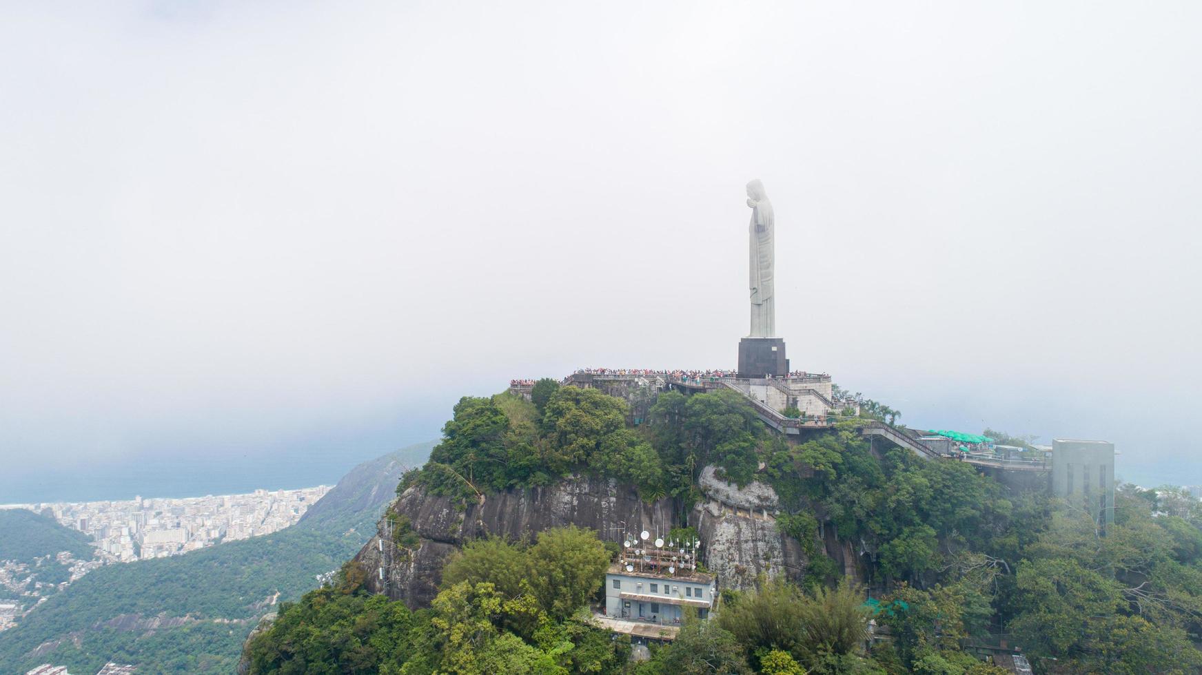 Rio de Janeiro, Rio de Janeiro, Brazil, Circa October 2019 Aerial view of Cristo Redentor, Christ the Redeemer Statue over Rio de Janeiro City, Brazil photo