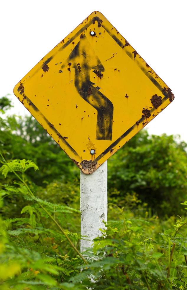 Signs, turn left and go straight. photo