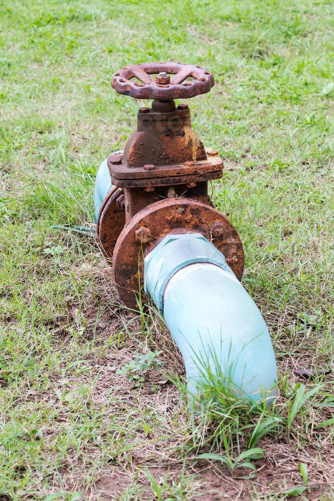 Rusty pipes with valves. photo