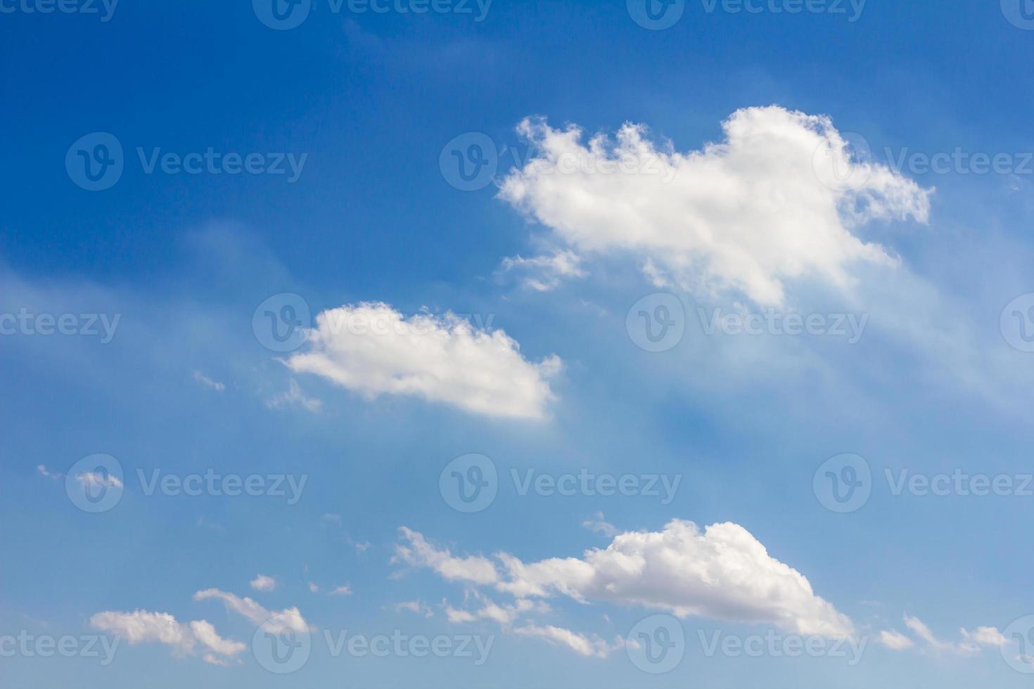 Fluffy clouds floating sky photo