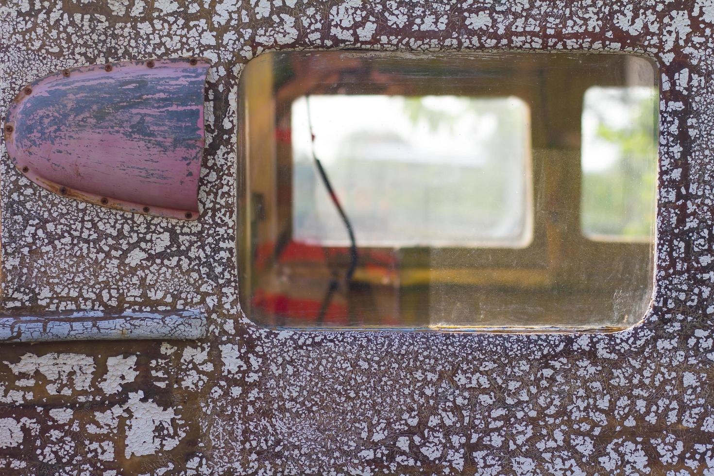 Peephole squares of boat photo