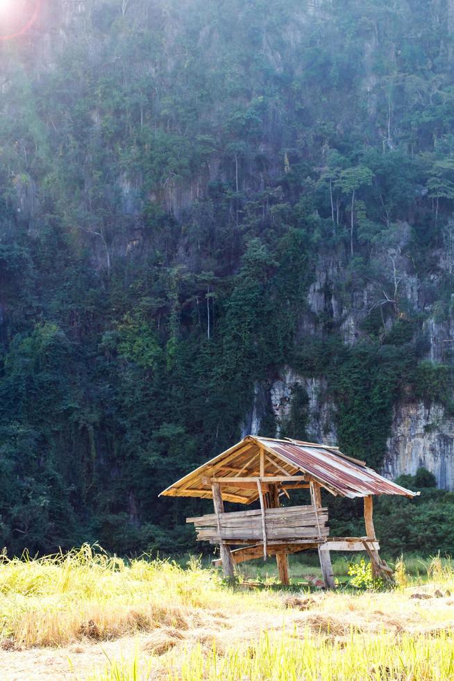 Wooden shacks near the cliff. photo