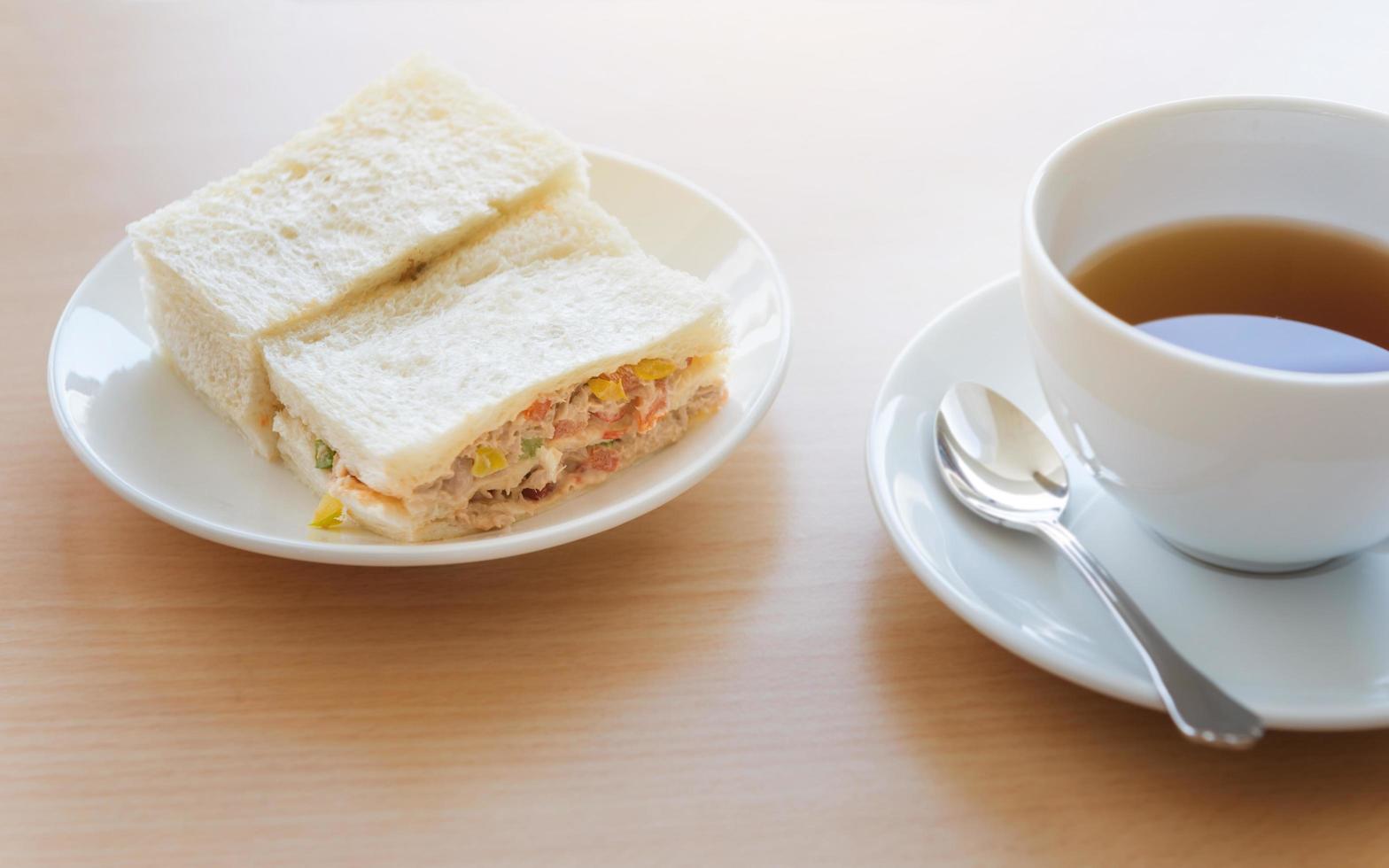 Tuna sandwich with hot tea photo