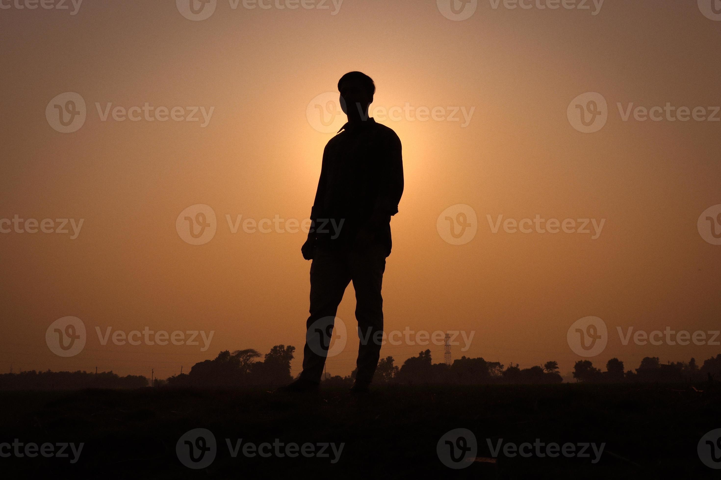 boy standing silhouette