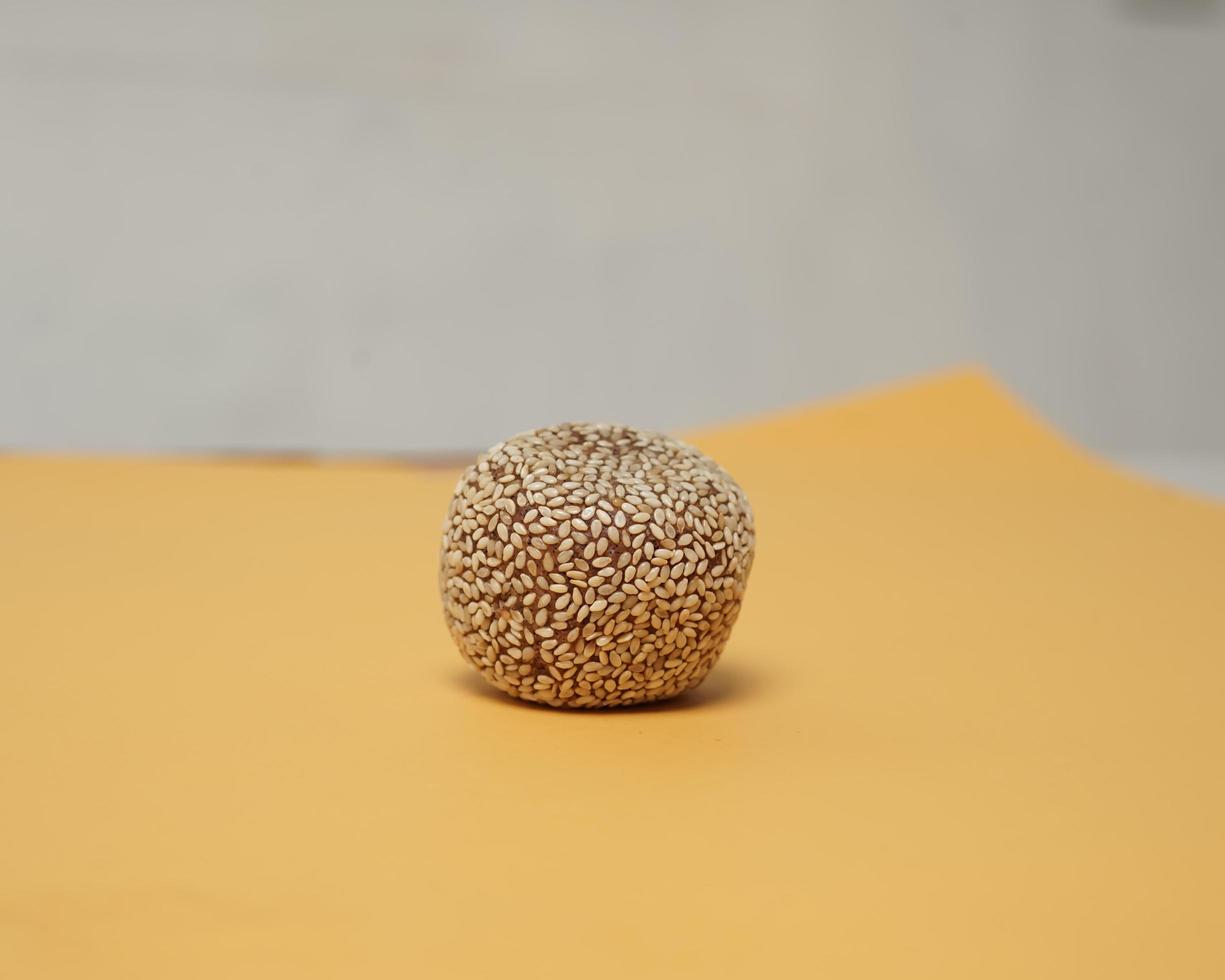 Popular Indonesian snacks that are loved by all groups from children to even adults. Onde-Onde is a typical Indonesian food made from glutinous rice flour with peanut paste, wrapped in sesame seeds. photo