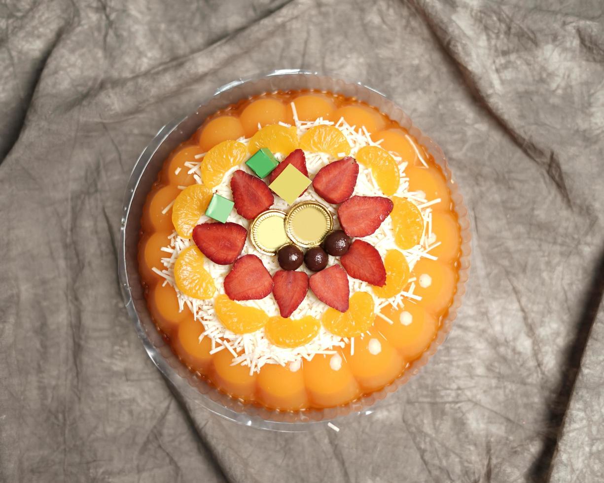 Lebaran parcels or Hampers, usually distributed at the moment of Eid. The packaging box contains a beautiful and attractive jelly cake. Also suitable for birthday cakes. Eid greetings. Focus Blur. photo