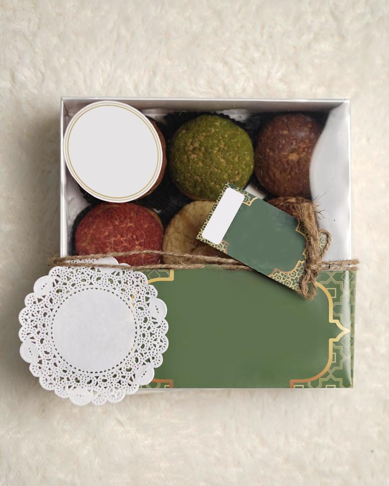 Craquelin choux is a Japanese eclairs with a crispy coating that tastes sweet and creamy. Creampuffs containing various flavors of fla, vanilla, chocolate, matcha. Eid hampers or parcels. focus blur. photo