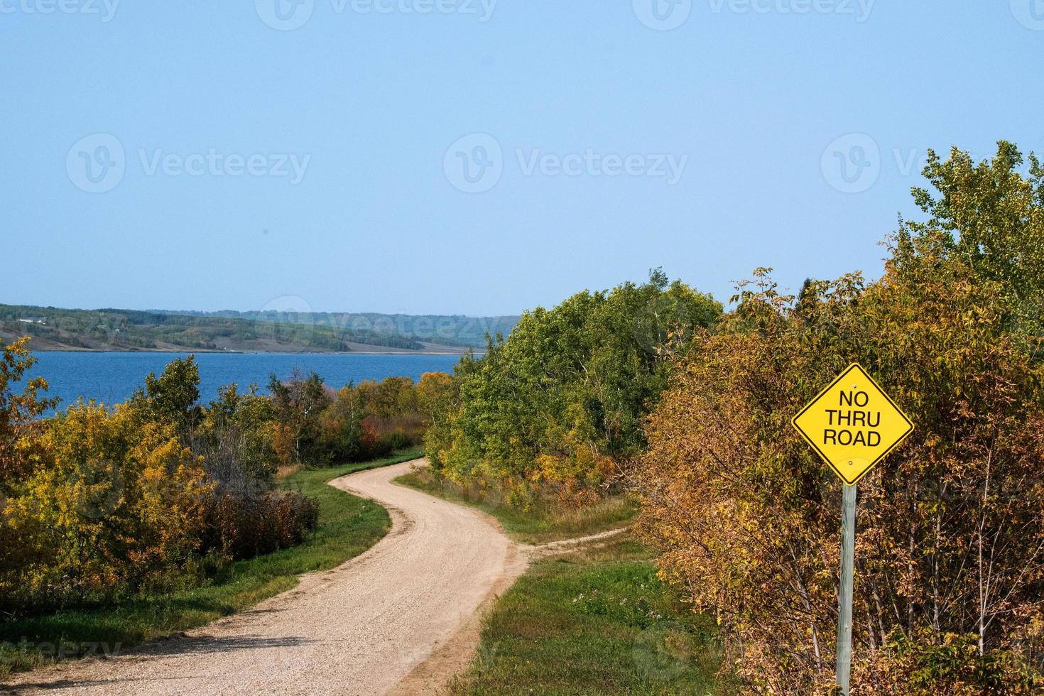 Back country road on the Canadian prairies in fall. photo