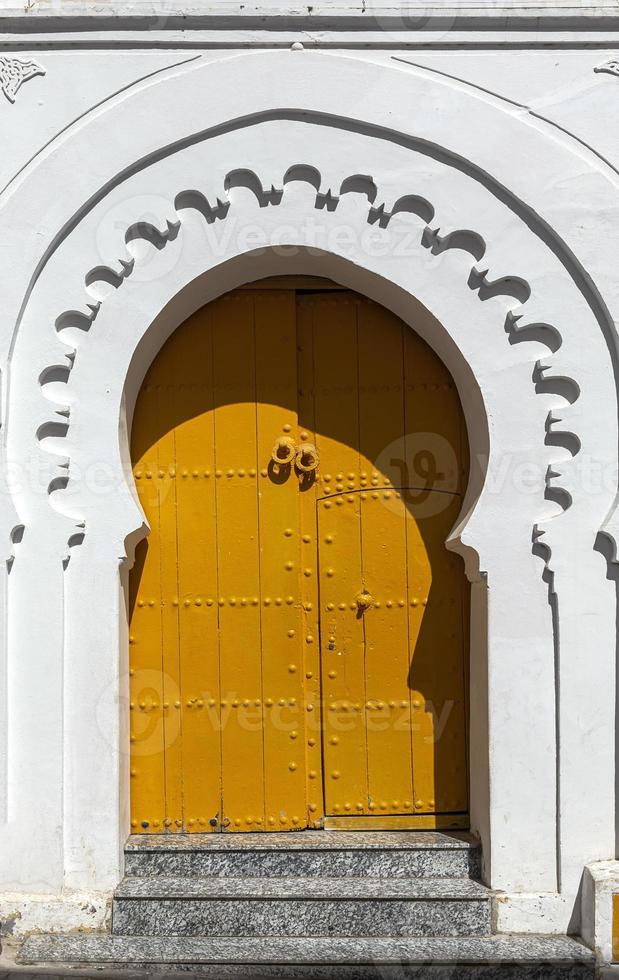 Arabic architecture in the old medina. Streets, doors, windows, details photo