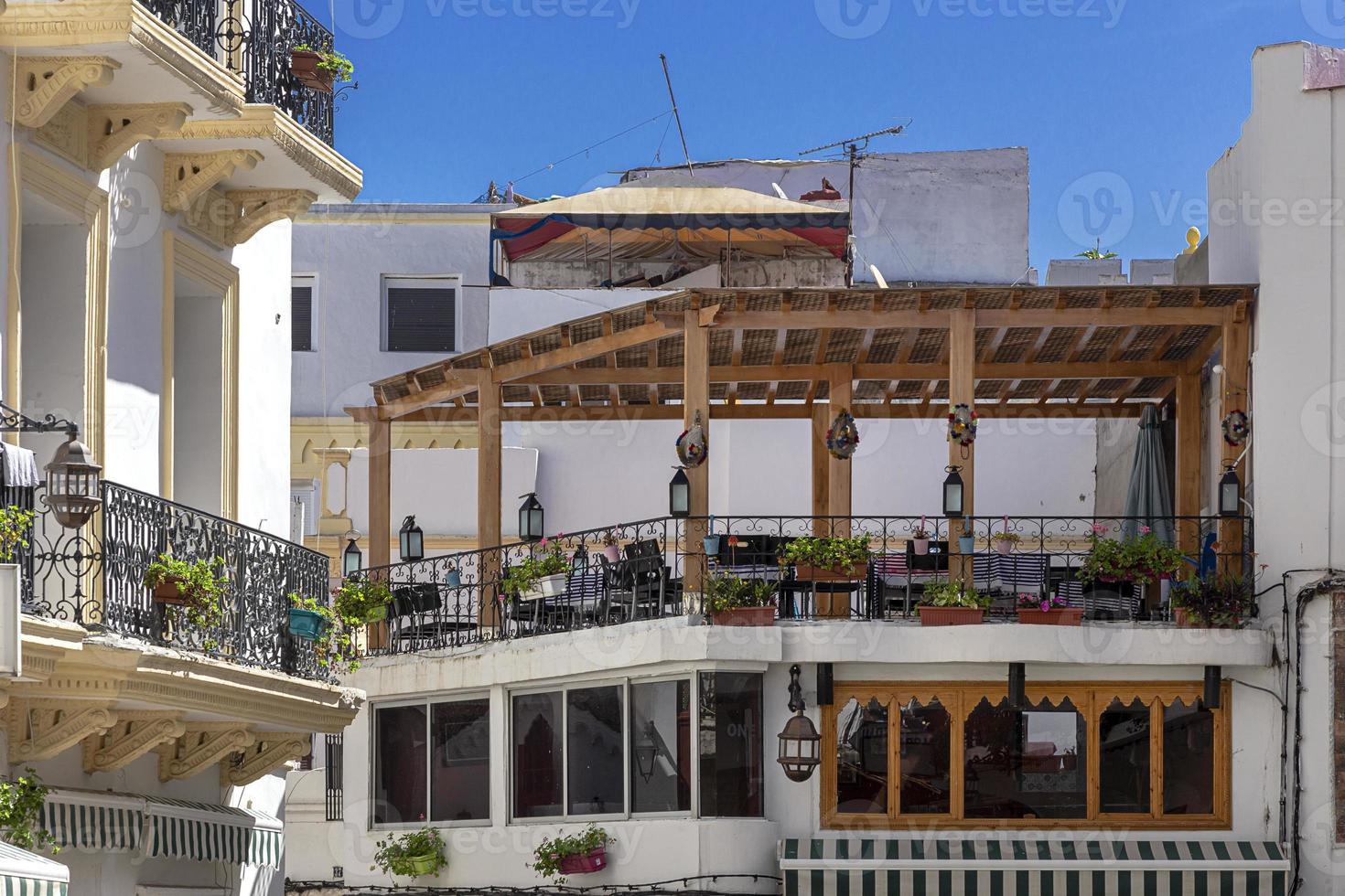 Arabic architecture in the old medina. Streets, doors, windows, details photo