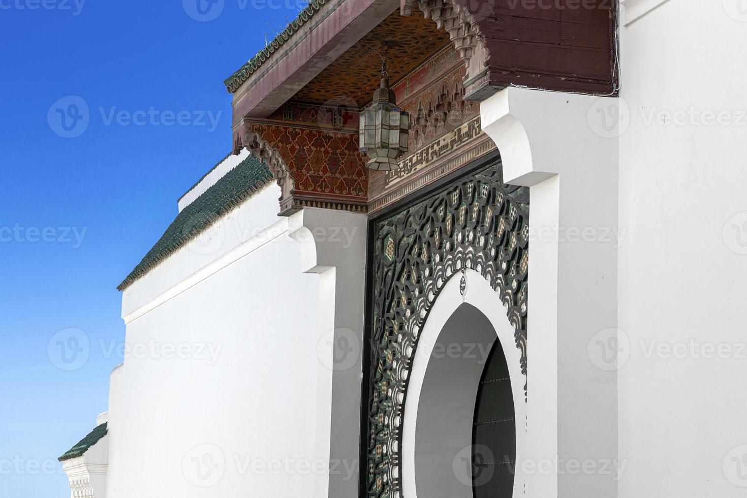 Arabic architecture in the old medina. Streets, doors, windows, details photo