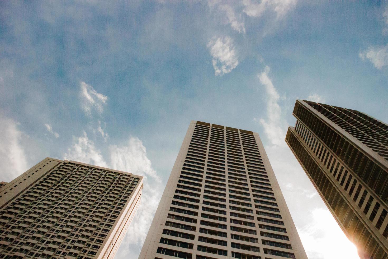 three large apartment buildings photo