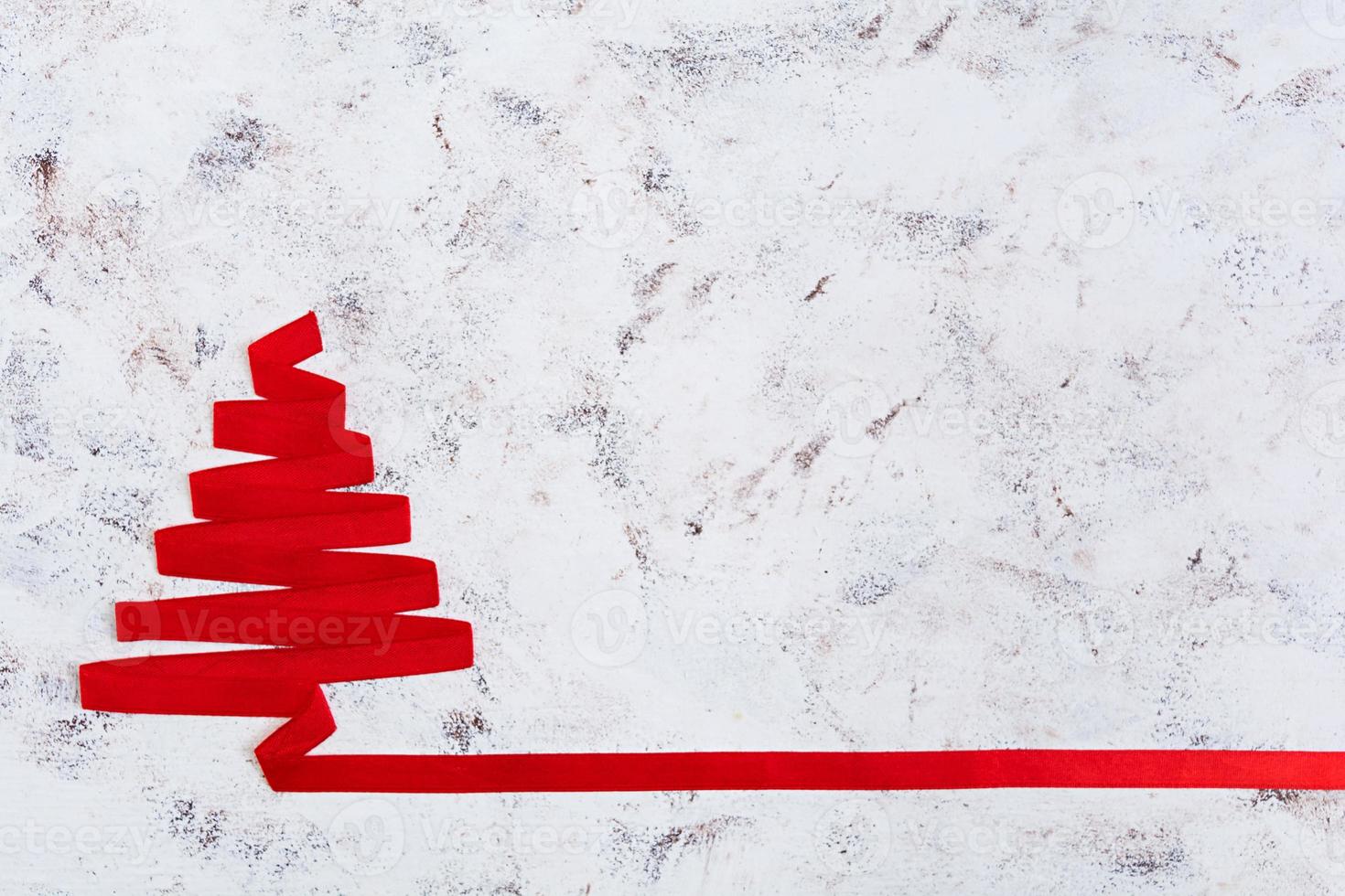 Christmas tree made of ribbon on white background. photo