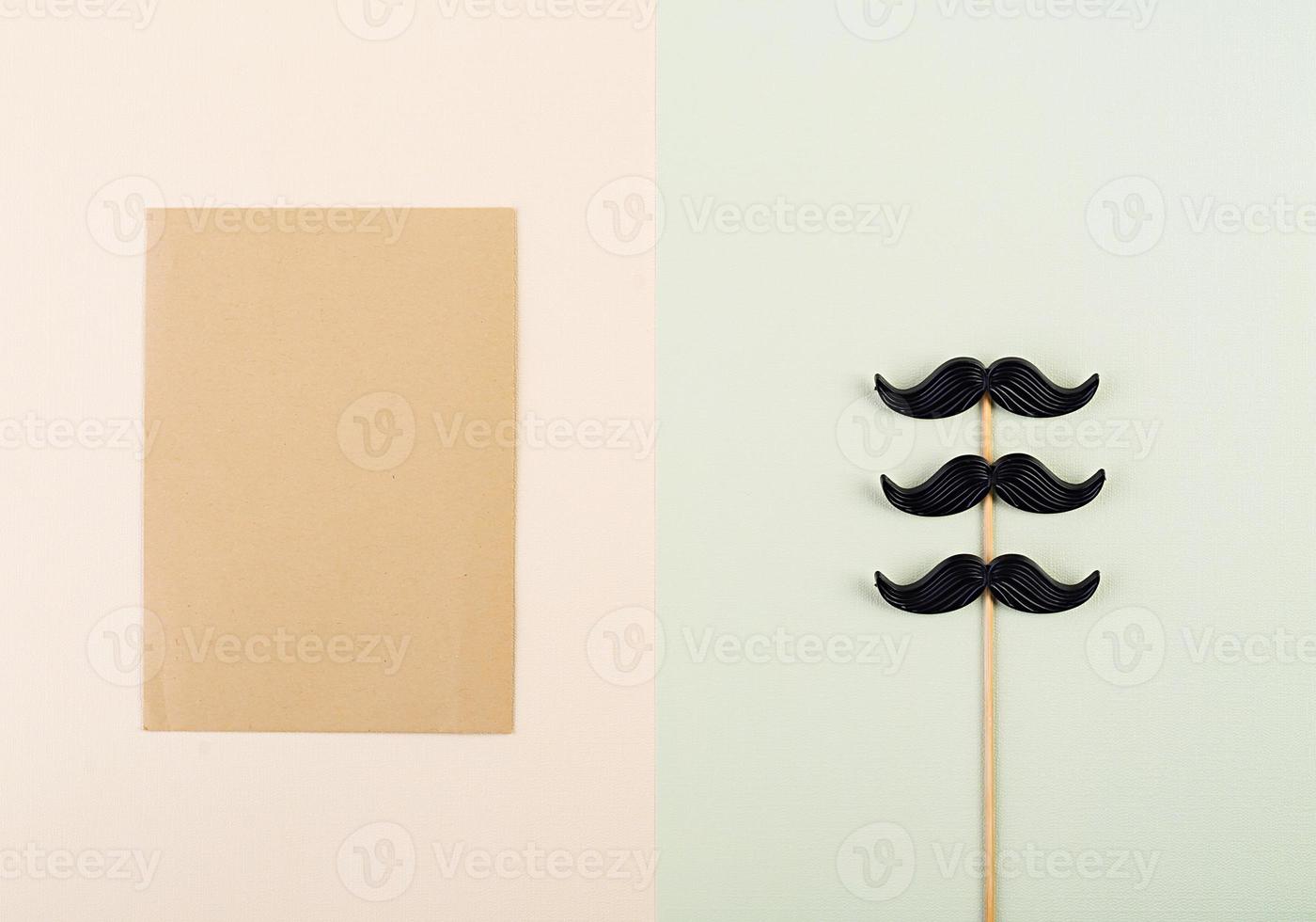 Mockup with blank paper and mustaches. Happy Fathers day. Background of fathers day. Top view. Flat lay. photo