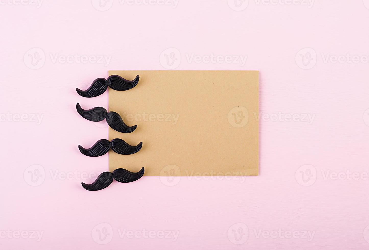 Mockup with blank paper and mustaches. Happy Fathers day. Background of fathers day. Top view. Flat lay. photo