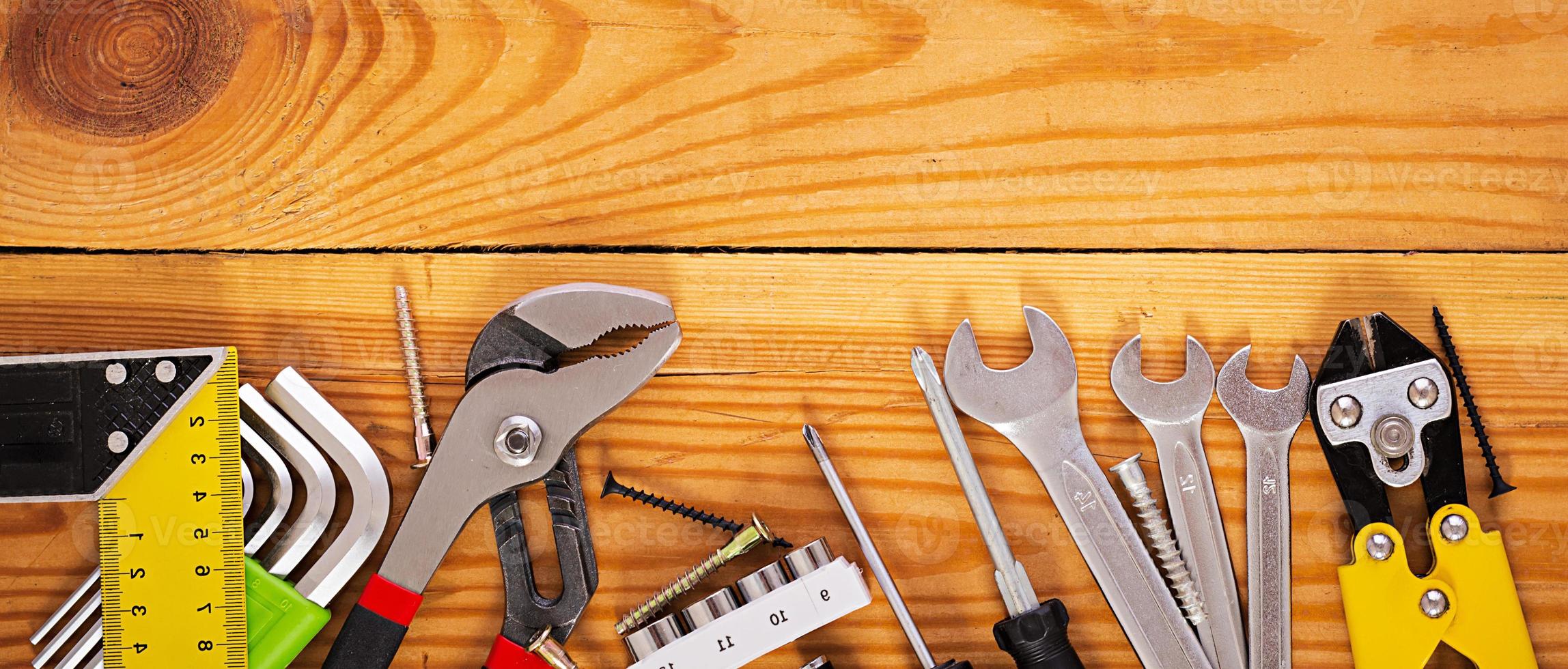 Banner with working tools on wooden rustic background. Top view. Banner. Copy space photo