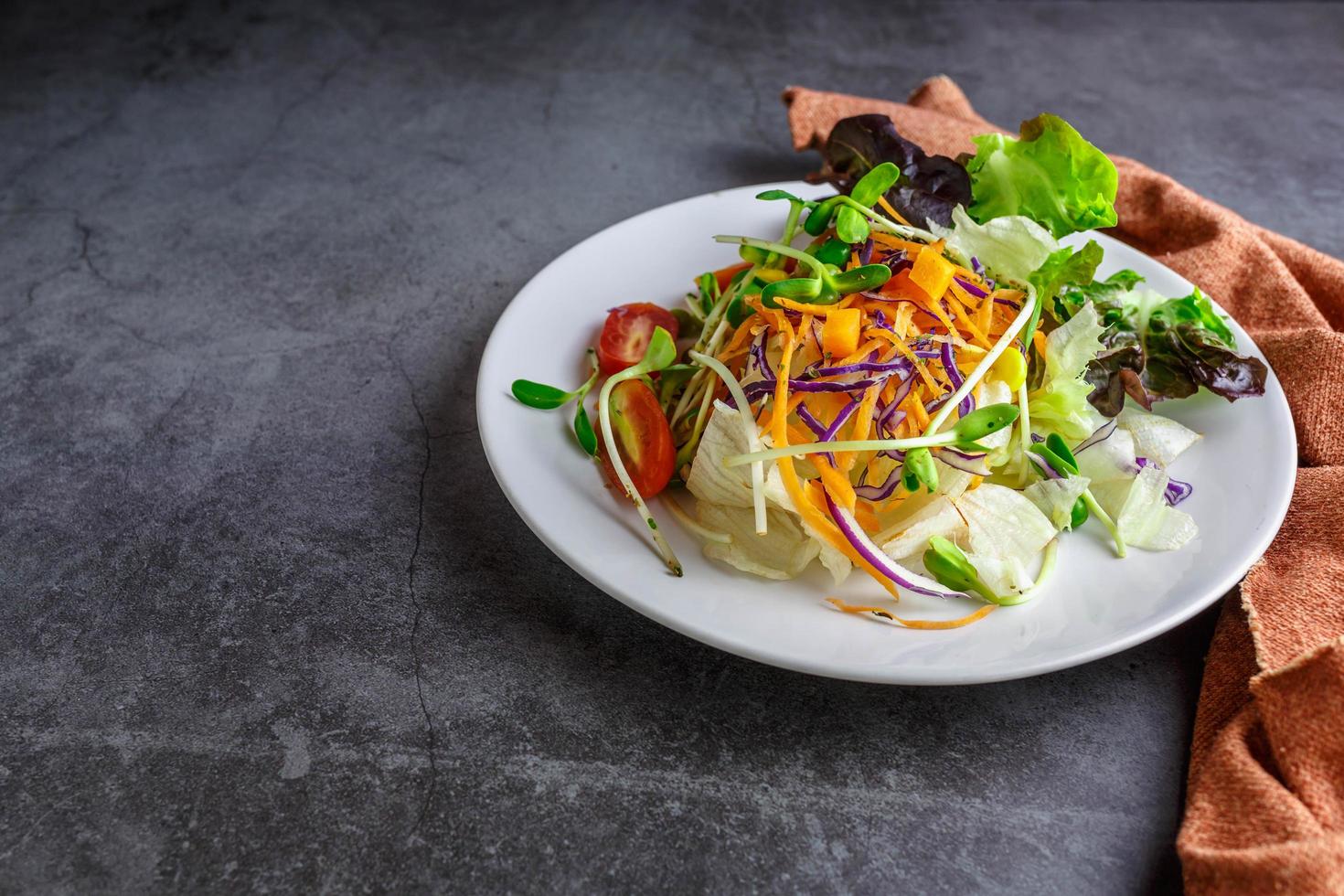 Vegetable salad healthy vegetarian food on a plate photo