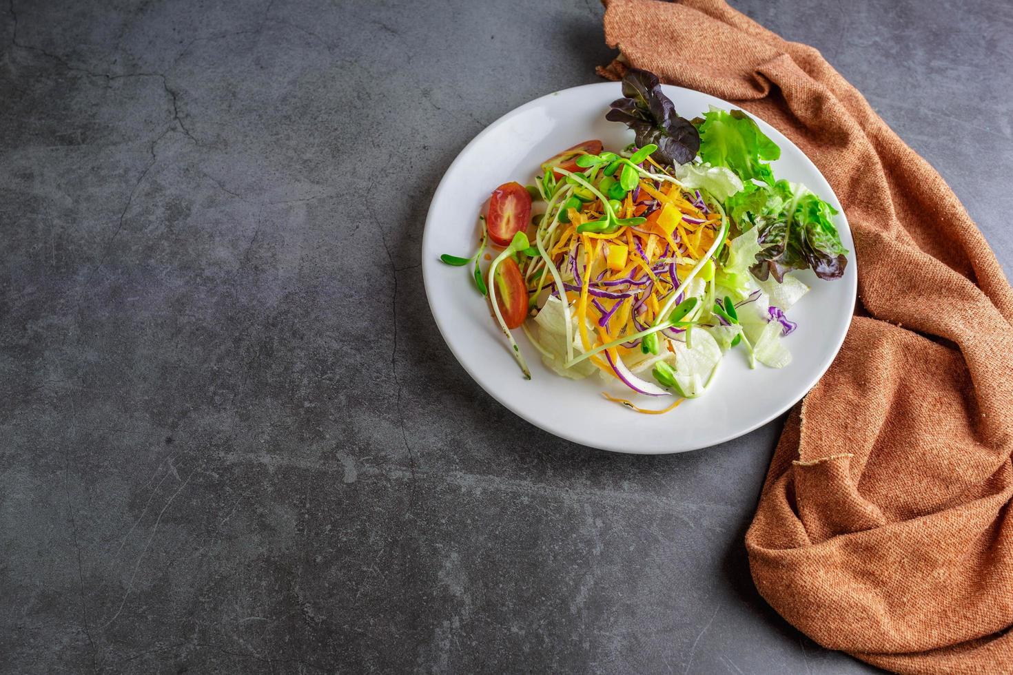 Vegetable salad healthy vegetarian food on a plate photo