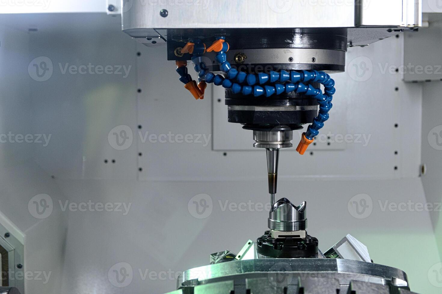 cnc machine working with workpiece on smart factory photo