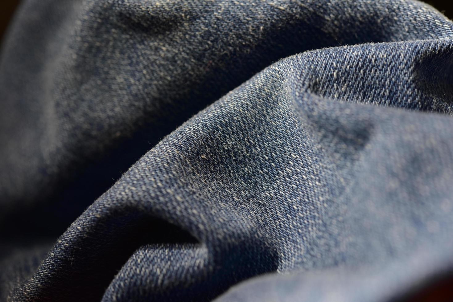 textura de jeans horizontales de mezclilla. foto