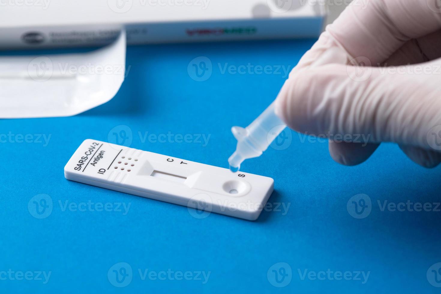 Corona virus antigen fast test. Lab card kit test for COVID-19. photo