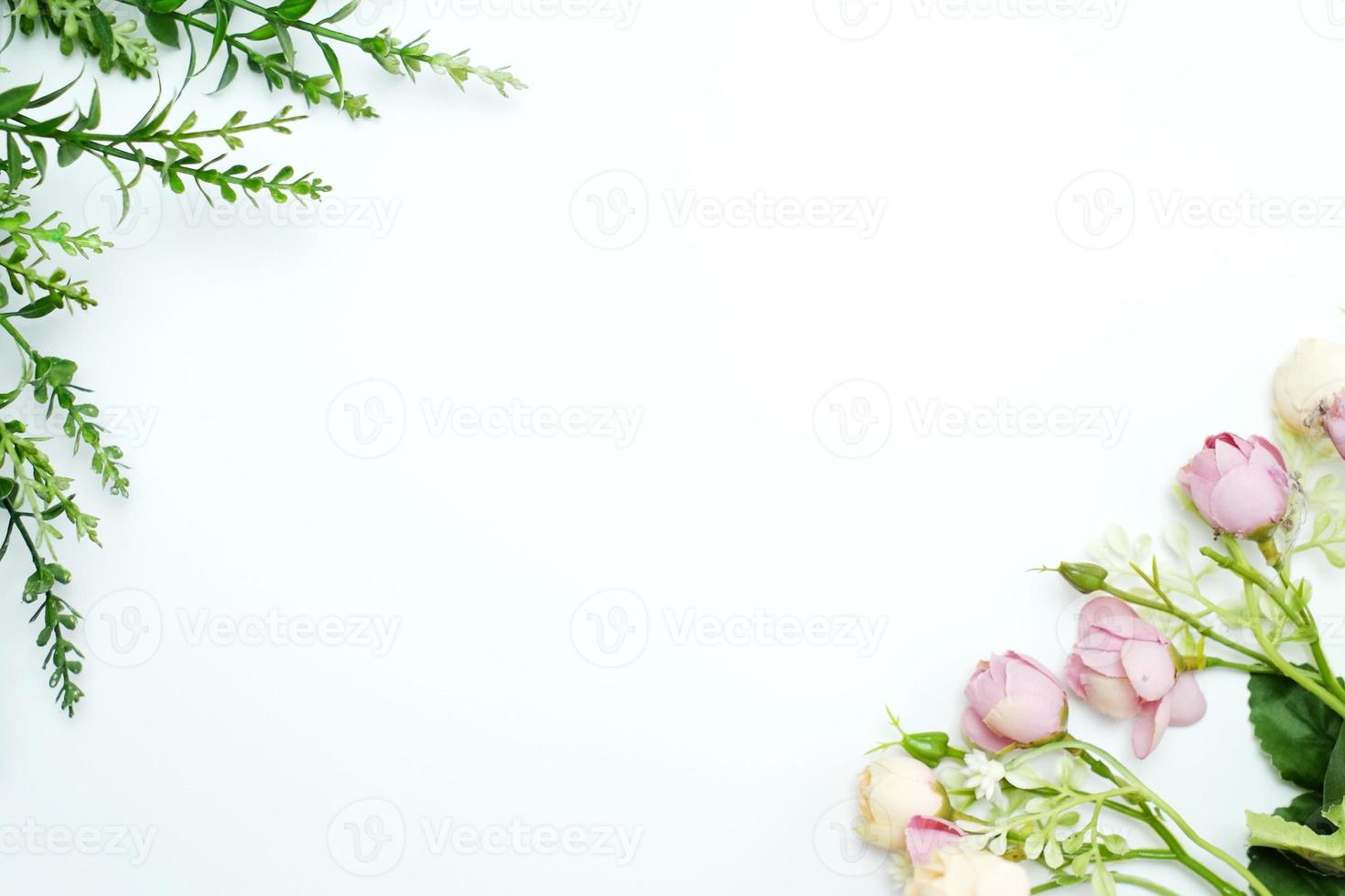 Flower composition. Pattern made of fresh leaves on a white background. Flat lay, top view, copy space photo