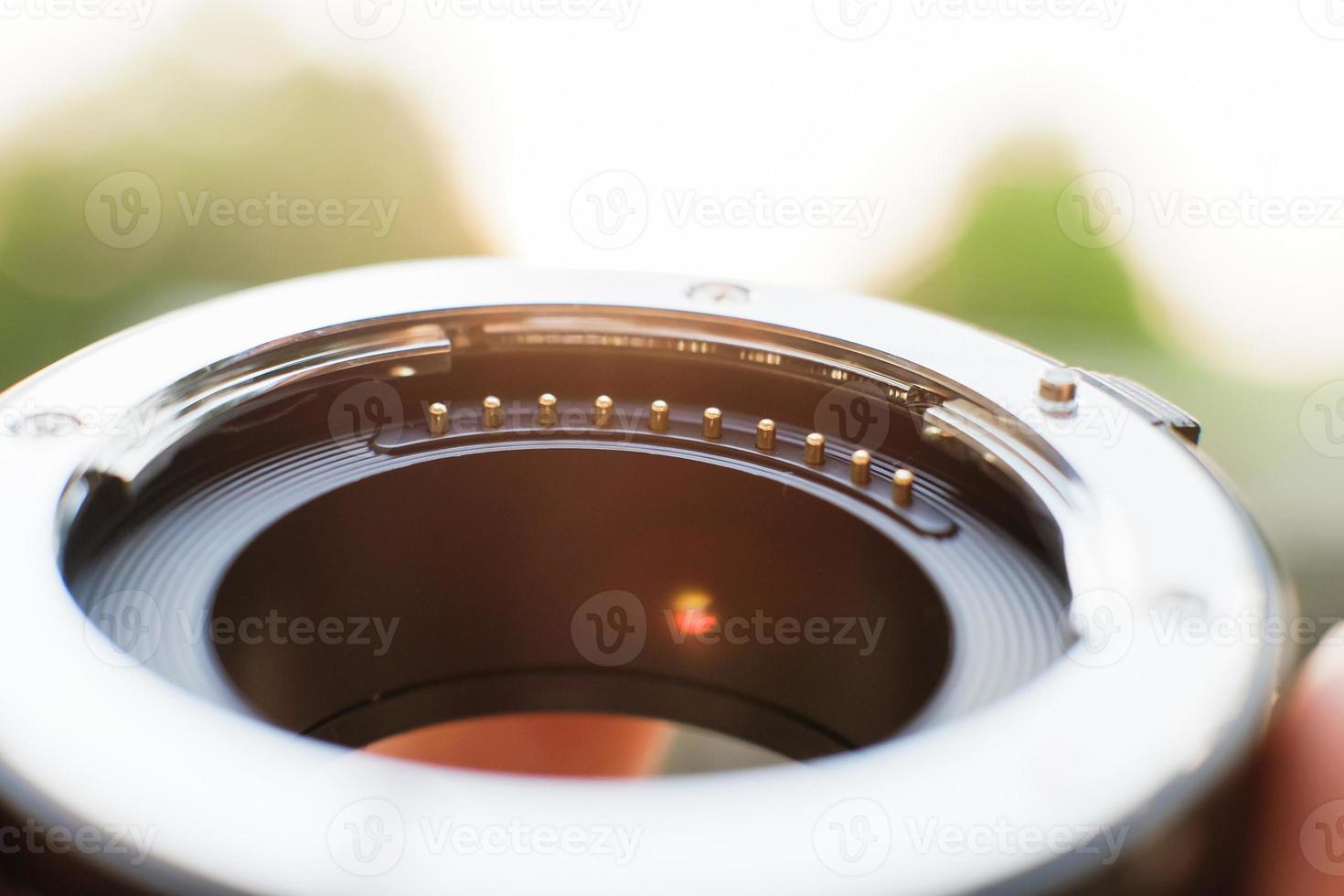 Lens adapter details in soft sunlight photo