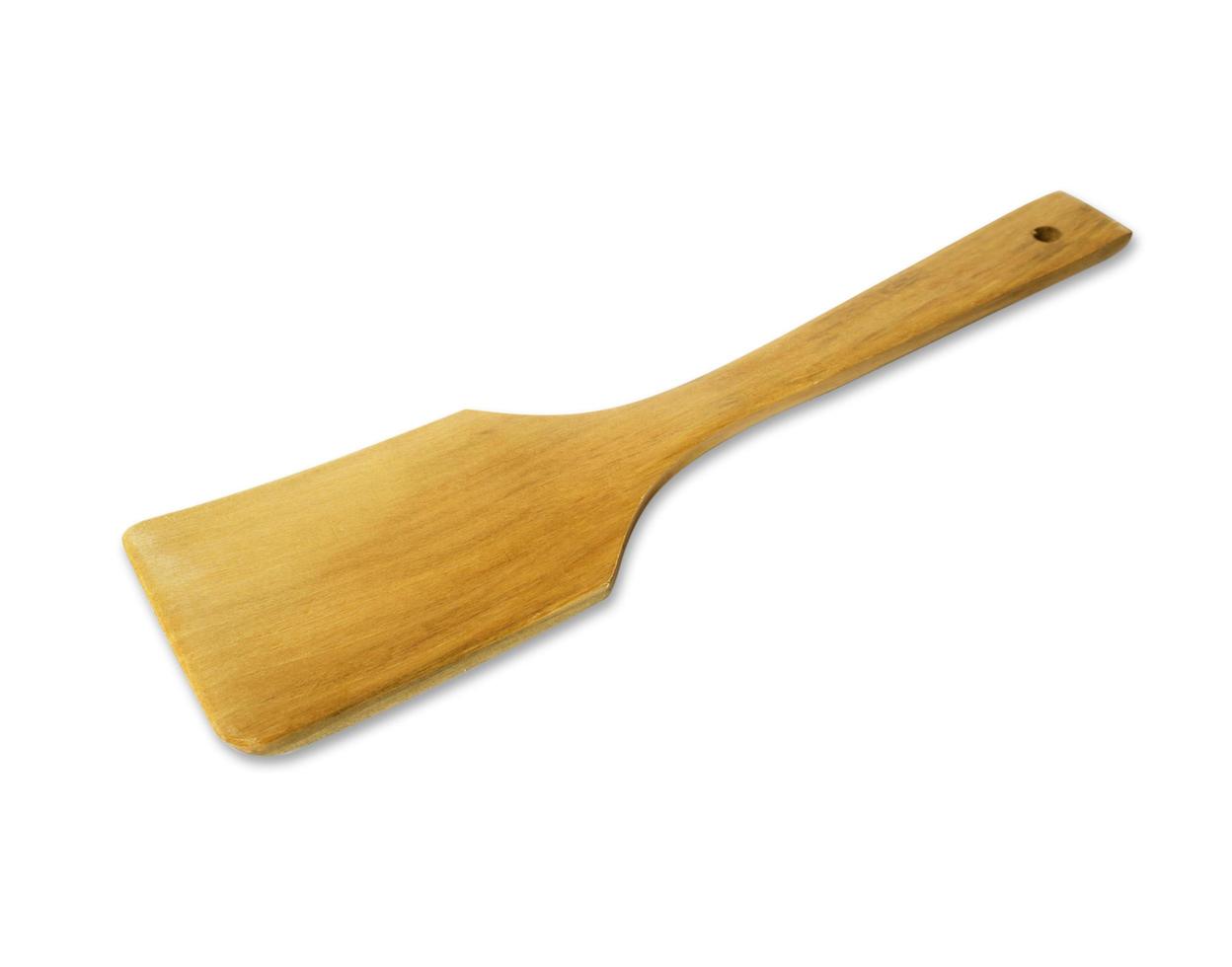 wooden kitchen utensils on white background photo