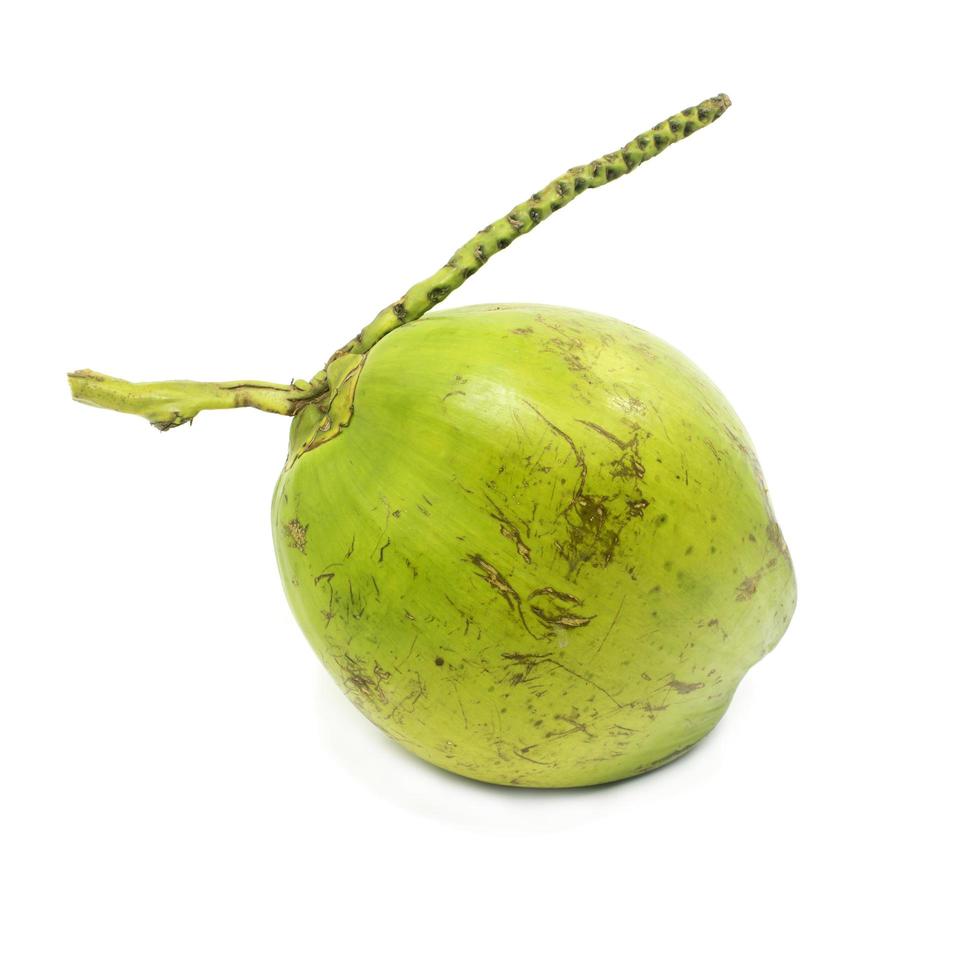 Green coconuts over white background photo