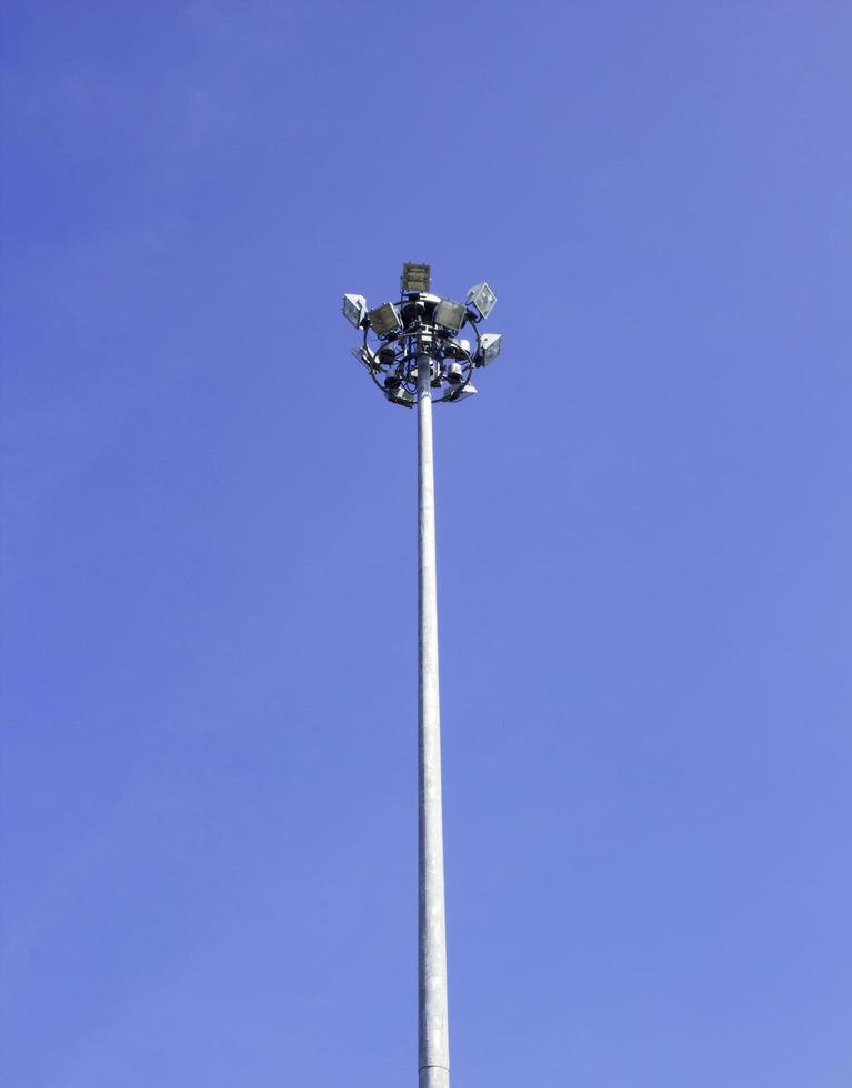 Highway spotlight or floodlight with nice blue sky background photo
