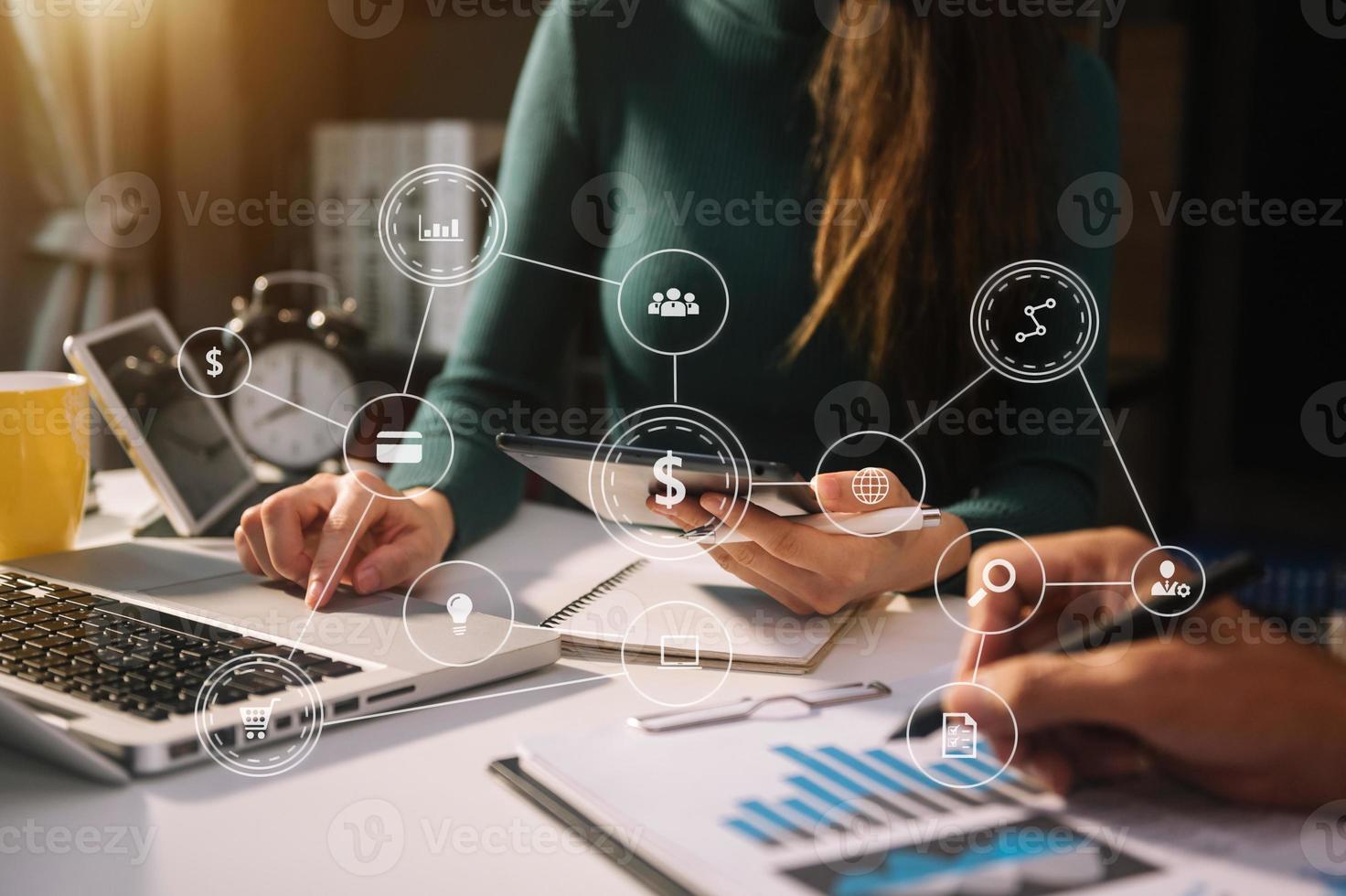 Working team meeting concept, business using laptop and smart phone and digital tablet computer with digital marketing media photo
