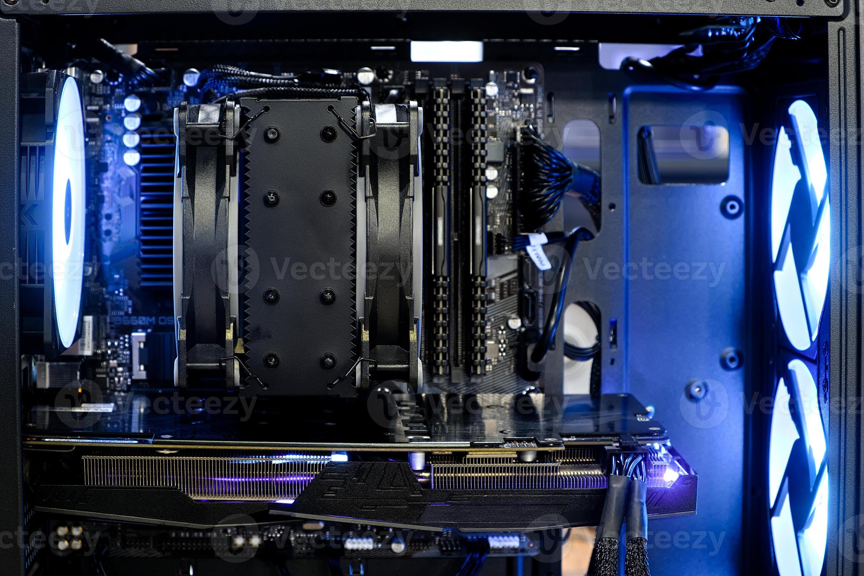 Inside computer desktop with heatsink and fan cooling cpu and