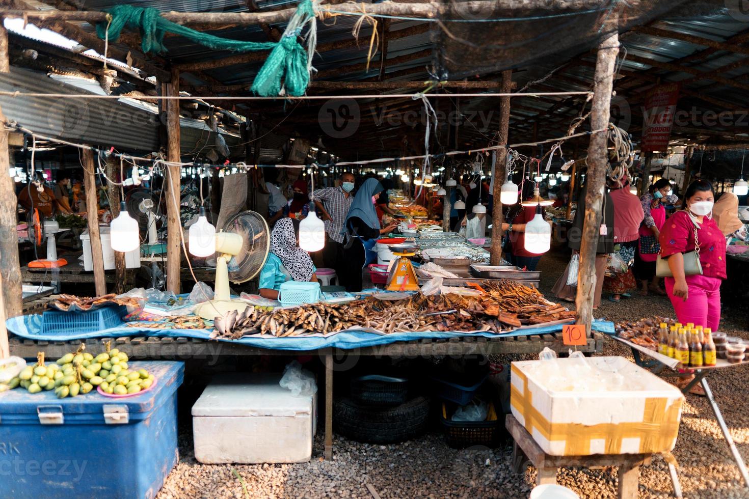 Fish market in Krabi,Raw seafood in a market near the tropical sea photo