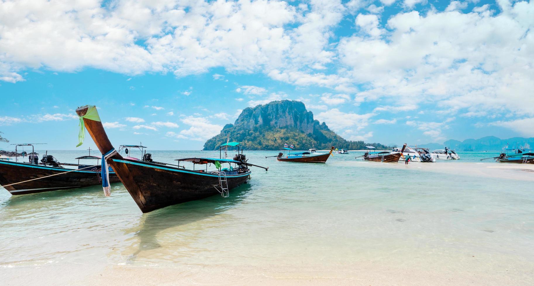 View of the long-tail boat and the beach on the island,tropical sea photo