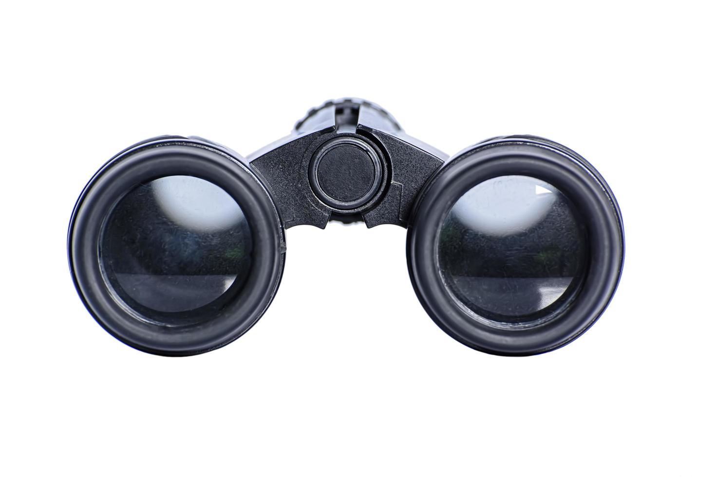 The black binoculars isolated on white background. photo