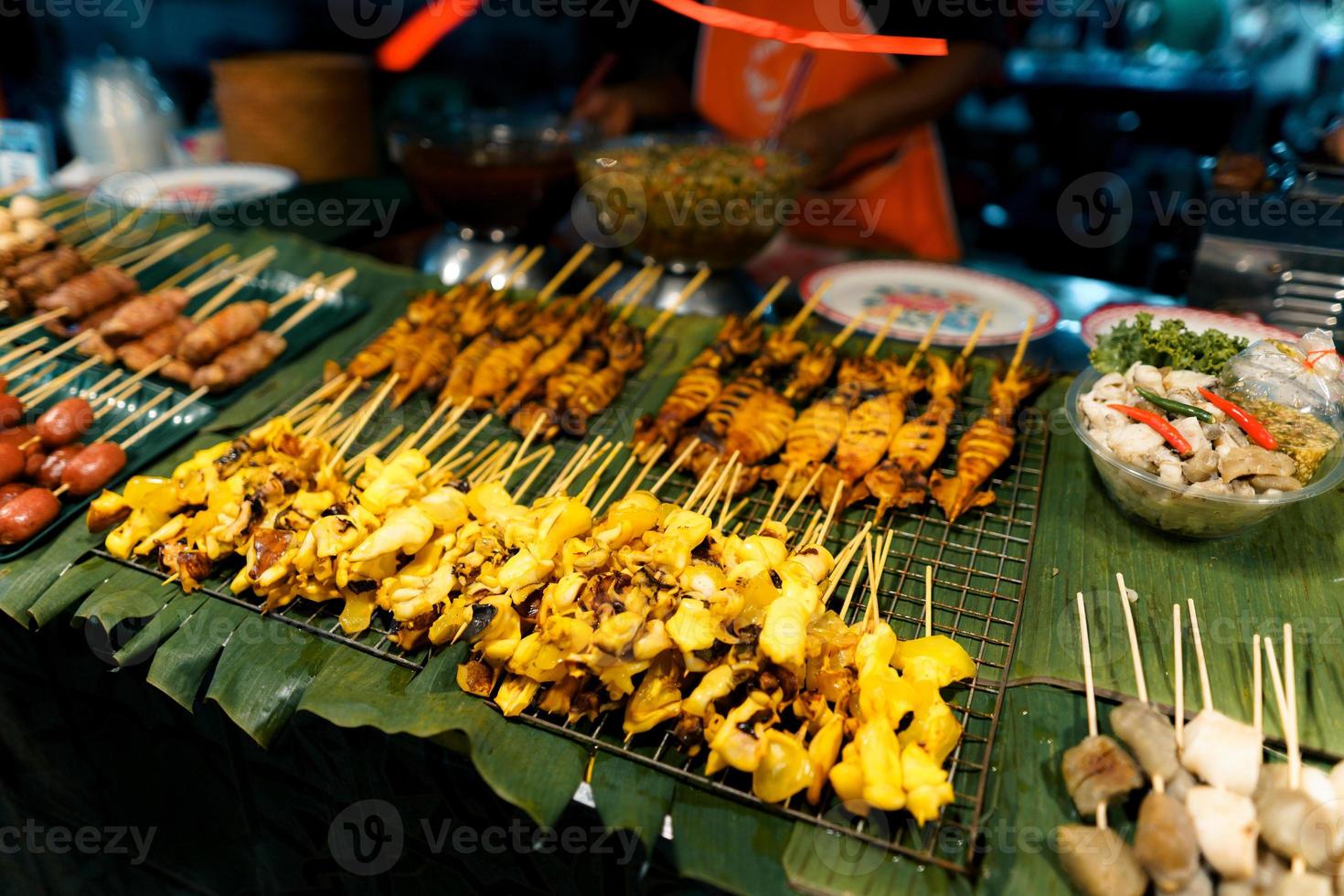 Food at a street market in the evening in Krabi photo