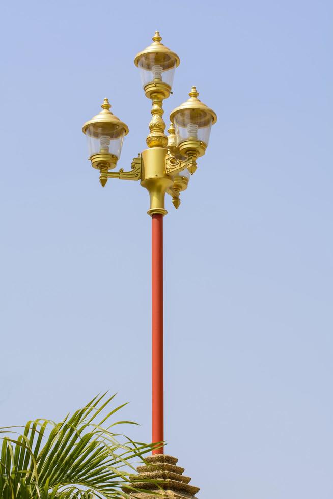 The metal classic lamp with blue sky. photo