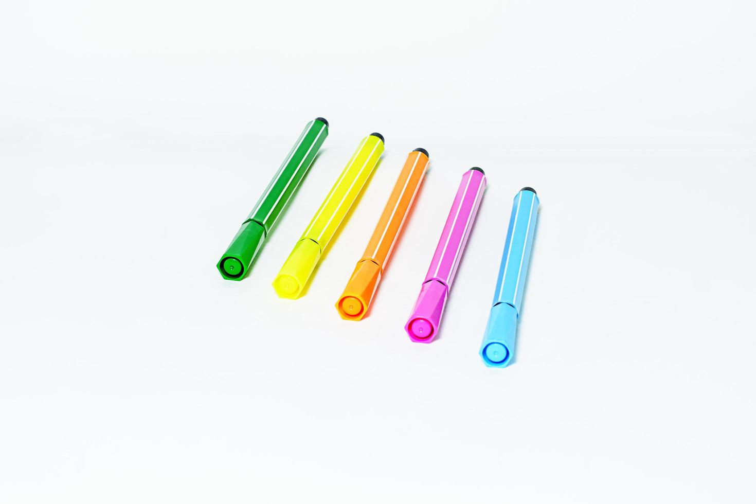 The multi colored magic pen on a white background. photo