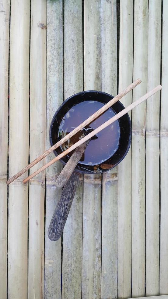 The noodles bowl on the wood table. photo