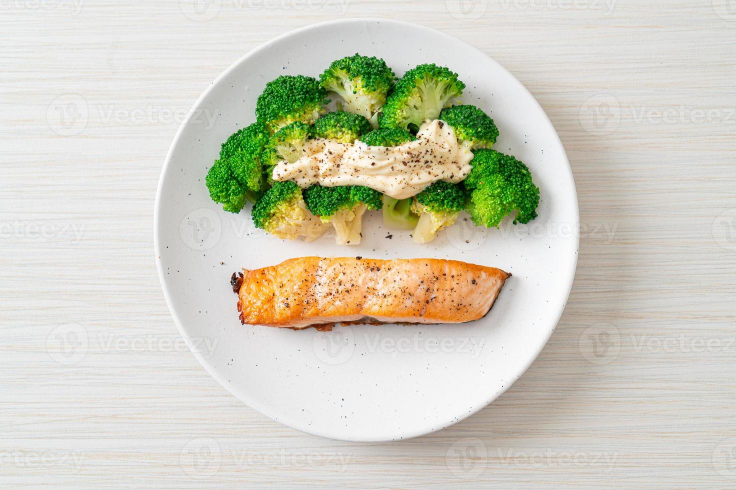 grilled salmon fillet steak with broccoli photo